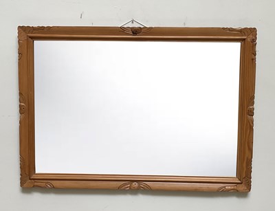 Lot 26 - A pine framed rectangular bevelled mirror, 71...