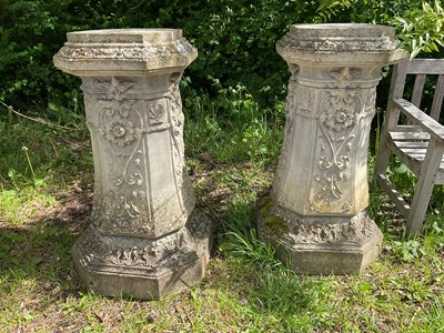 Lot 2138 - A pair of reconstituted stone garden pedestals,...