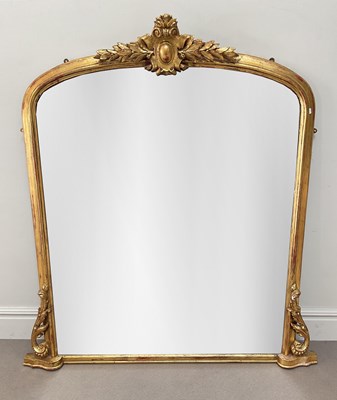 Lot 2079 - A c1900 gilt framed arch topped overmantel...