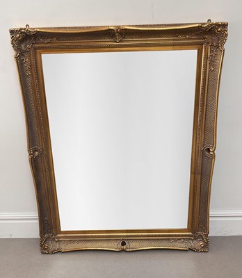 Lot 2090 - A reproduction Rococo style gilt framed wall...