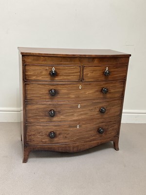 Lot 2042 - A Victorian mahogany bowfront chest of two...