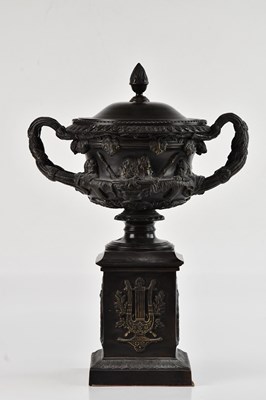 Lot 2324 - A reproduction bronzed metal model of a...