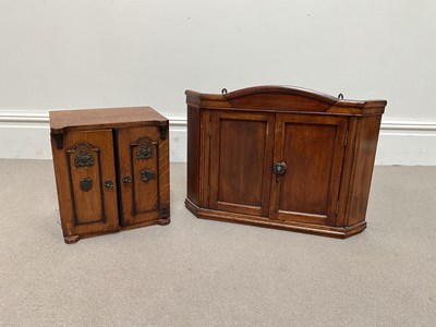 Lot 2056 - An early 20th century hanging corner cupboard...