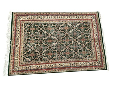 Lot 2172 - A green ground eastern style hand knotted...