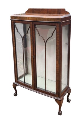 Lot 109 - An early 20th century walnut display cabinet,...