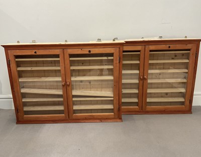 Lot 32 - Two modern stained pine hanging display...
