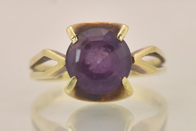Lot 1270 - A 14ct yellow gold amethyst set dress ring,...