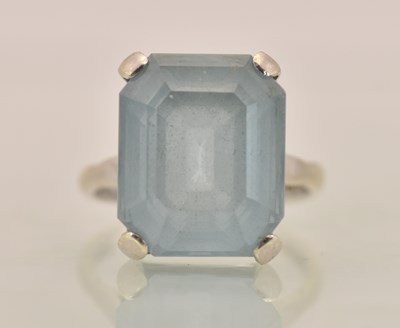 Lot 1281 - A 9ct white gold large aquamarine set dress...