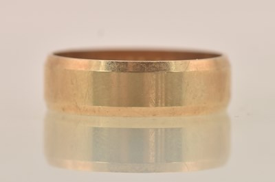 Lot 1322 - A 9ct yellow gold band ring, size R, approx...