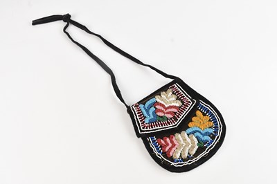 Lot 1131 - A late 19th century Iroquois beadwork bag,...