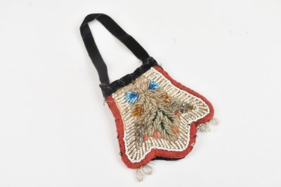 Lot 1161 - A late 19th century Iroquois small beadwork bag.