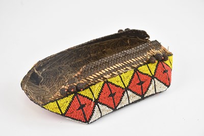 Lot 1183 - A 19th century Indonesian beaded basket, width...