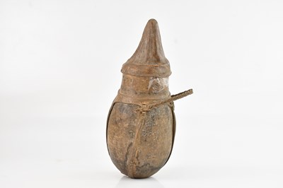 Lot 1176 - A late 19th century Maasai drinking vessel and...