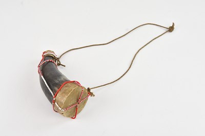Lot 1186 - A Native American buffalo horn powder flask,...