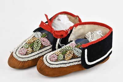 Lot 1121 - A pair of Iroquois moccasins, with floral...