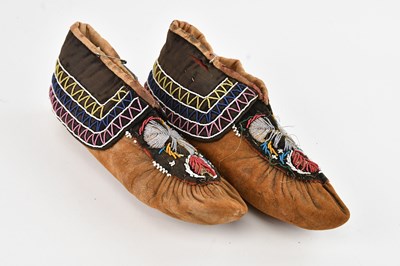 Lot 1122 - A pair of 19th century Iroquois moccasins,...