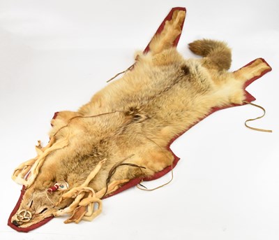 Lot 1117 - A Native American coyote skin pelt, with trade...
