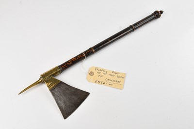 Lot 1138 - An 18th century Islamic war axe, 56cm.