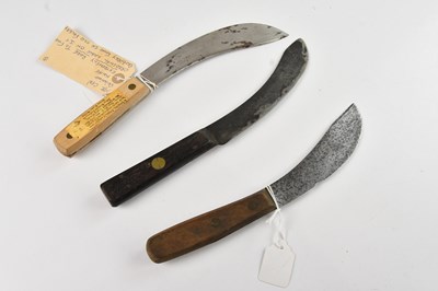 Lot 2270 - A group of three skinning knives, including a...