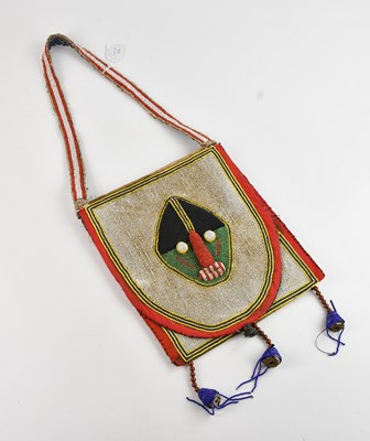 Lot 1152 - A large African beadwork bag, decorated with...