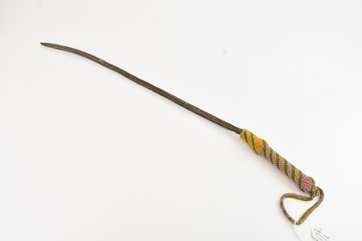 Lot 1145 - A Zulu cattle whip, with beaded handle and...