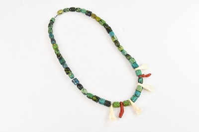 Lot 1113 - A Plains Native American natural turquoise,...