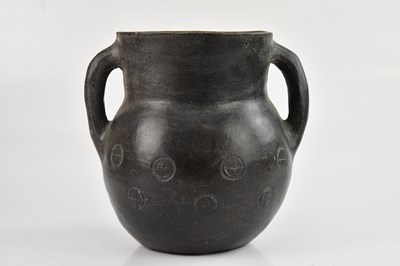 Lot 1187 - A Zulu pottery twin handled beer pot, height...