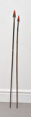 Lot 1173 - A pair of African barbed spears, length 144cm,...