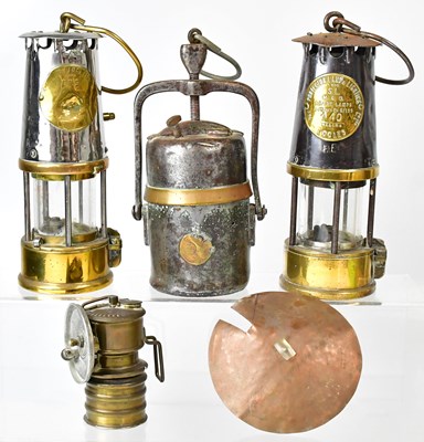 Lot 513 - Four lamps comprising two Davy Safety Lamps,...