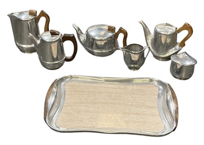 Lot 1078 - PICQUOT WARE; a mid century six-piece tea and...
