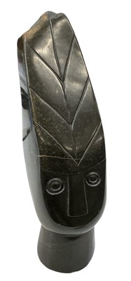 Lot 1055 - A modern African carved hardstone portrait...