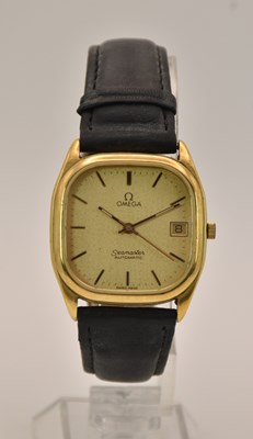 Lot 1676 - OMEGA; a vintage gentleman's gold plated...