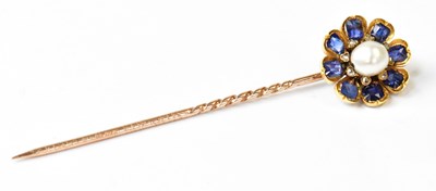 Lot 971 - A 19th century yellow metal stick pin set with...