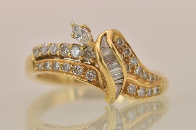 Lot 1250A - A yellow metal diamond set florally modelled...