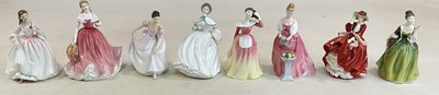 Lot 333 - ROYAL DOULTON; a collection of eight figures...