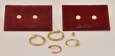 Lot 1459 - Four pairs of 9ct yellow gold earrings...