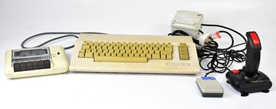 Lot 429 - COMMODORE 64; a partial game system, including...