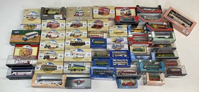 Lot 155 - A collection of diecast model coaches and...