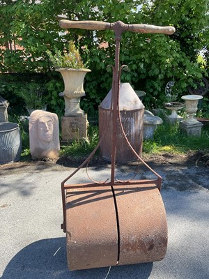 Lot 2165 - A cast iron garden roller.