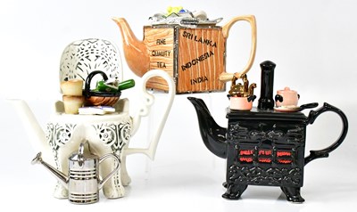 Lot 281 - A collection of novelty teapots, comprising a...