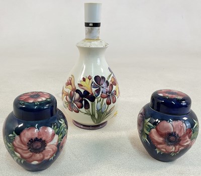 Lot 258 - MOORCROFT; a pair of 'Anemone' ginger jars...