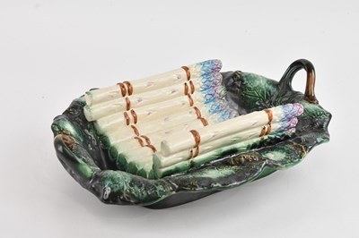 Lot 1337 - A Victorian style majolica asparagus serving...