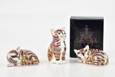 Lot 1256 - ROYAL CROWN DERBY; three Imari animal form cat...