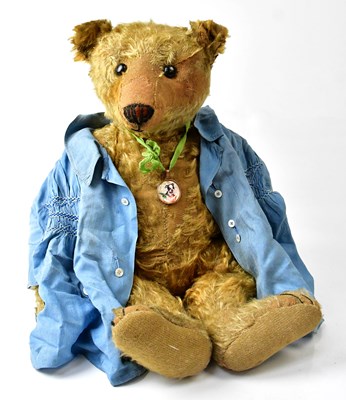 Lot 488 - STEIFF; a vintage teddy bear with blonde...