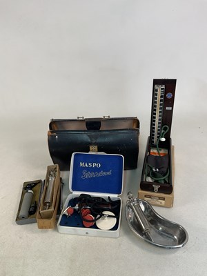 Lot 56 - ACCUSION; a blood pressure monitor in a...