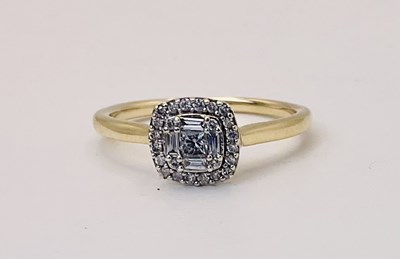 Lot 656 - A yellow metal diamond cluster ring, set with...