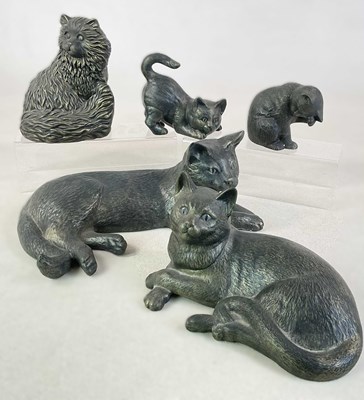 Lot 344 - A group of bronzed ceramic cats in various...