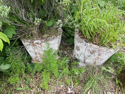Lot 2155 - A pair of reconstituted stone garden planters,...