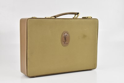 Lot 2206 - YVES SAINT LAURENT; a vintage travelling case,...
