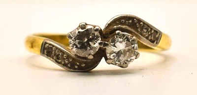 Lot 641 - An 18ct yellow gold and platinum, two stone...